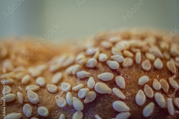 Fototapeta Extreme Close-Up of a Bagel Covered in Sesame Seeds