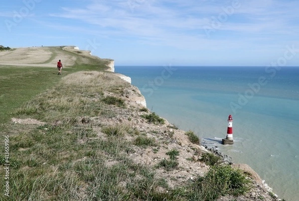 Fototapeta The rocky cliff edge of Anglli, the cliff complex of the 7 Sisters in England