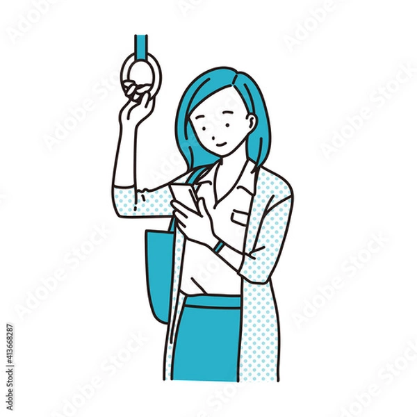 Obraz 電車でスマホを見る女性
