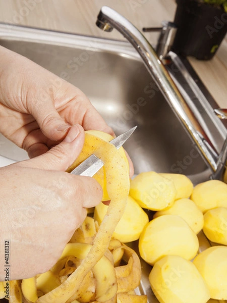 Obraz Kartoffeln schälen