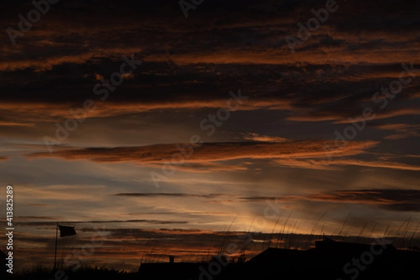 Obraz glowing clouds at the beach