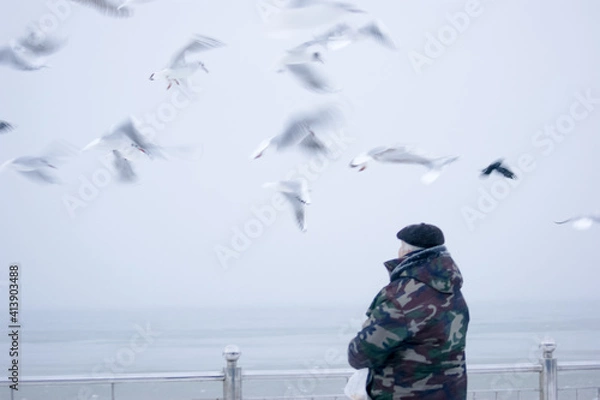 Obraz person looking at sea