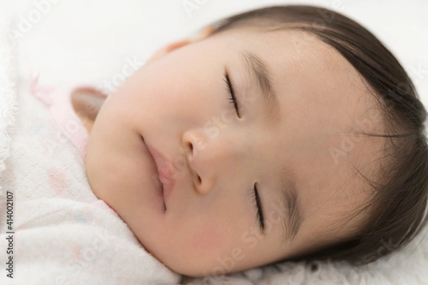 Fototapeta お昼寝している幼児