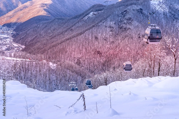 Obraz Lift cabins in a mountain ski resort  snowy slope  in a  winter