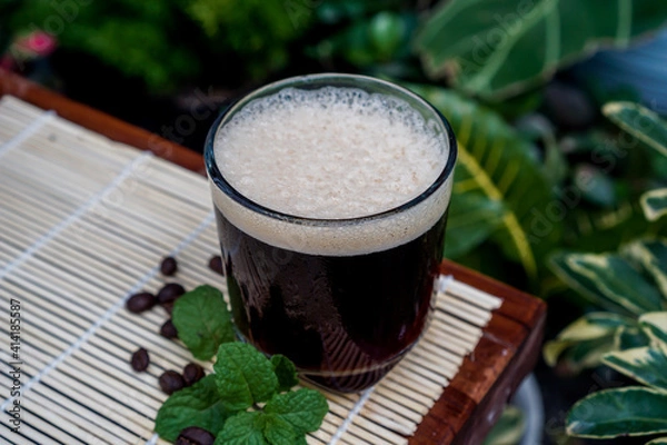 Fototapeta The root beer coffee taste will offer a deep black licorice flavor that does have a mild sweetness in the cup of Joe. This specific type of coffee does have a nice acidity