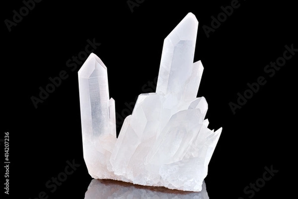 Fototapeta Amazing pure Quartz Crystal cluster gemstone closeup macro isolated on black background. Natural rare white mineral rough stone. Beautiful crystals arrangement