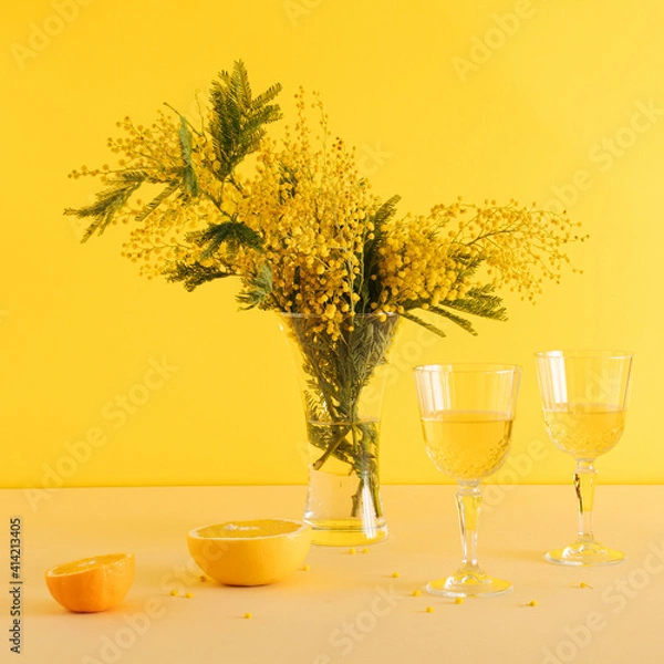 Fototapeta Realistic decorative valentines party with fresh fruits, lemon and grape and two glasses of wine on yellow background.
