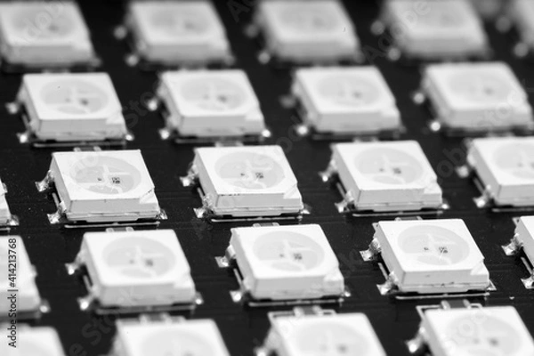 Fototapeta  LED panel with light emitting diodes, macro black and white technology background