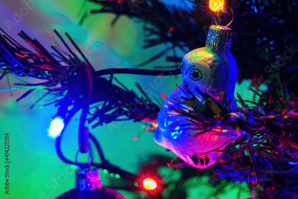 Fototapeta Glass Christmas decoration in the shape of a white owl.