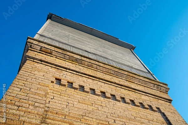Obraz old water tower. unusual perspective bottom view