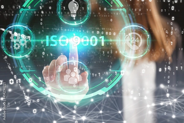 Fototapeta Business, Technology, Internet and network concept. Young businessman working on a virtual screen of the future and sees the inscription: ISO 9001