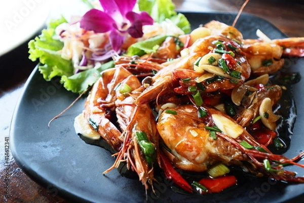 Fototapeta Garlic Fried Shrimp is a very spicy dish that is perfect for eating with alcoholic beverages.