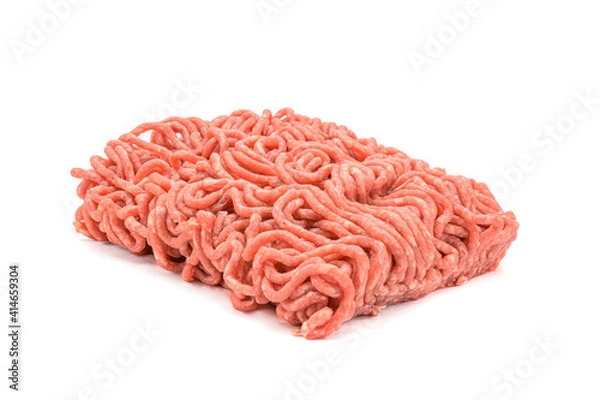 Fototapeta Fresh pork and beef minced meat, garnished with garlic, red pepper and dill.Isolated on a white background.