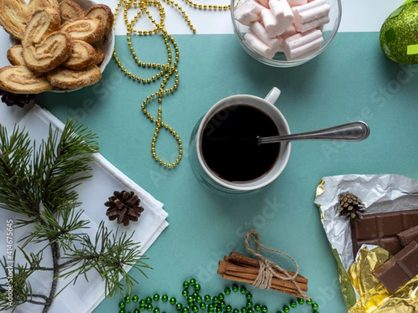Fototapeta new year's flat lay. green background. top view photo. Christmas decorations, coffee. New year, Christmas, Valentine's day.