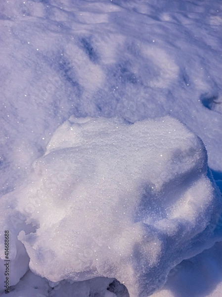 Fototapeta photo of snow on a winter day. winter forest. landscape with snow. Snow texture, top view.