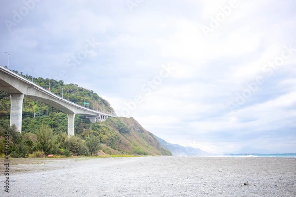 Obraz The Jinlun Bridge in , Taitung, Taiwan - 
January 17 2021: The Jinlun Bridge next to the ocean is the most beautiful bridge in Taitung, Taiwan.