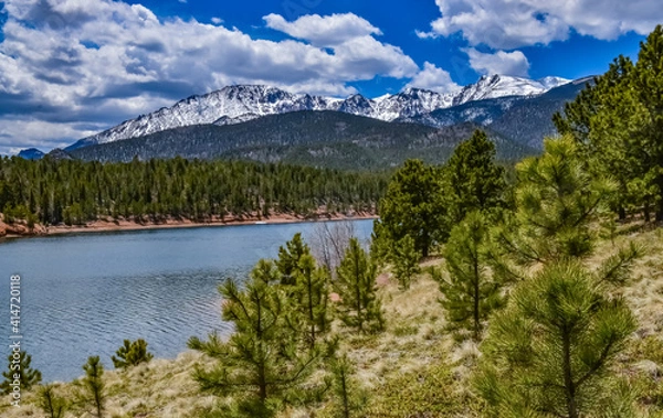 Fototapeta Crystal Creek reservoir near snow-capped mountains Pikes Peak Mountains in Colorado Spring, US