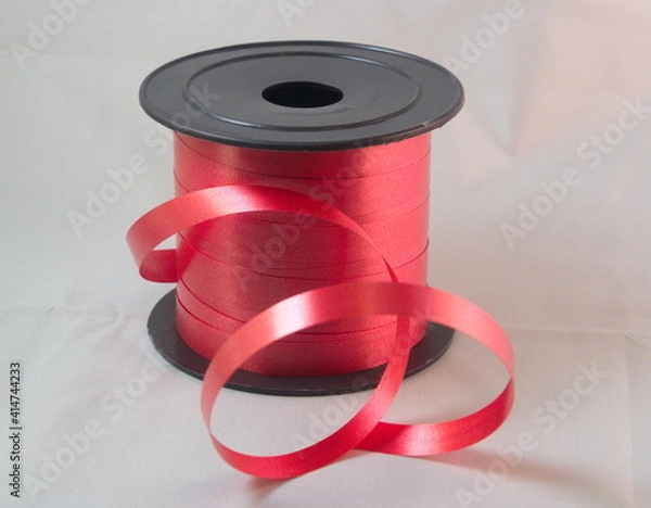 Obraz Gift strings on plastic reels.