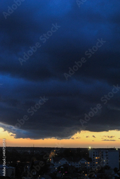 Obraz clouds over the city