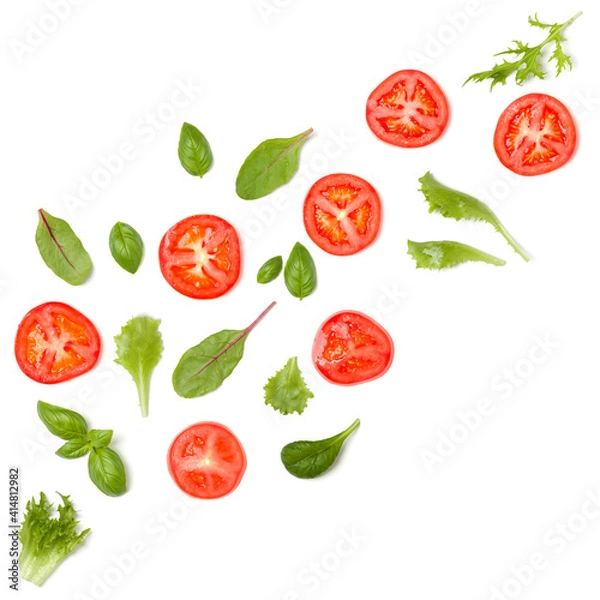 Obraz Creative layout made of tomato slices and lettuce salad leaves. Flat lay, top view. Food concept. Vegetables isolated on white background. Food ingredients pattern.