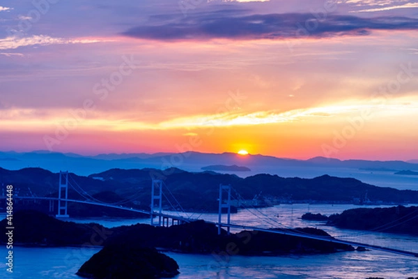 Obraz 夕焼がきれいな橋と海