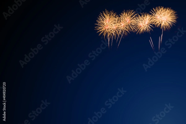 Obraz colorful fireworks on blue background