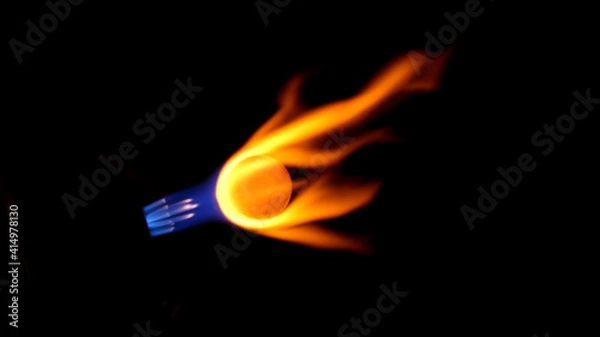 Obraz Orange and Yellow flames from a Lampworker making a pipe