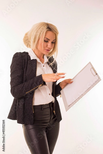 Fototapeta Woman points to empty space for advertisement.