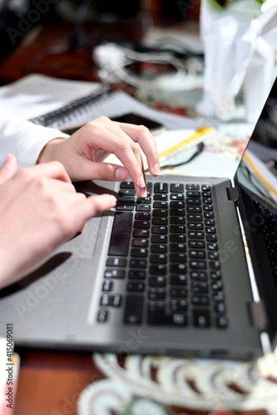 Fototapeta using laptop, in home office due to pandemic