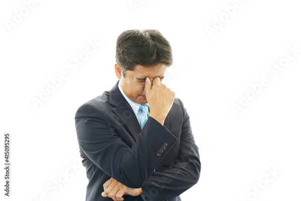 Fototapeta 苦悩するビジネスマン