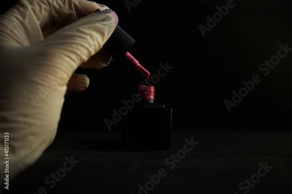 Obraz hand holding a microscope