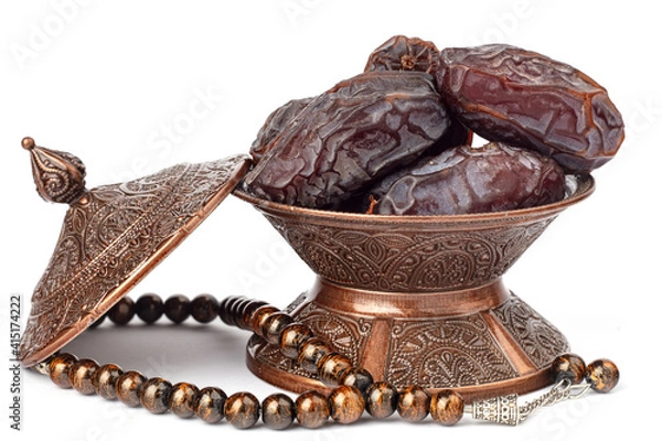 Fototapeta Dates on a bronze plate isolated