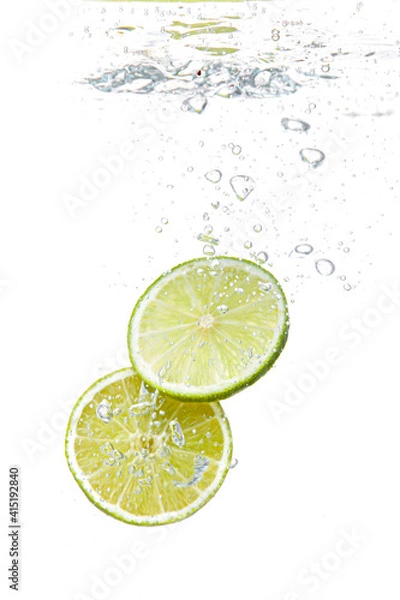 Obraz lemon and lime slice in water