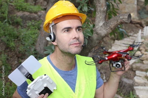 Fototapeta Drone operator in construction site