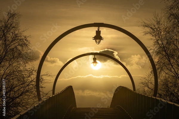 Fototapeta Sunset Through The Rings