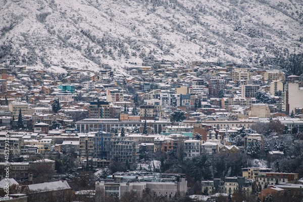 Fototapeta Snow in the winter city