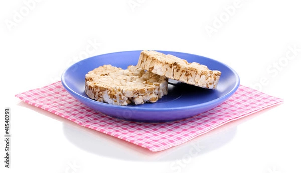 Fototapeta Bread snacks on saucer with napkin isolated on white