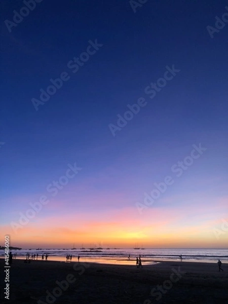 Fototapeta Sunset seen from the beach