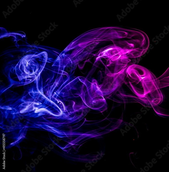 Obraz Colored smoke on black background