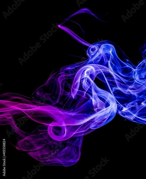Obraz Colored smoke on black background