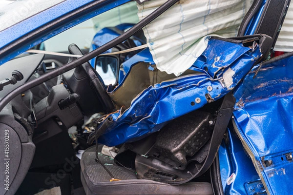 Obraz blue car crashed from the driver's side
