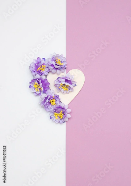 Fototapeta Three magenta blooms getting out from violet to white background.