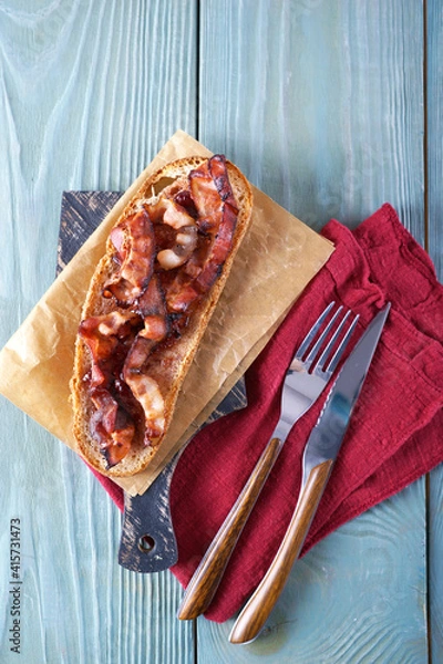 Fototapeta Toast with fried bacon and strawberry jam