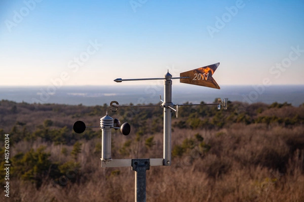 Fototapeta Rauen, Brandenburg, Germany - February 21, 2021 Weather station at the observation tower in the Rauener Berge with construction date.