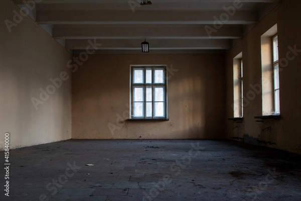 Fototapeta room with window in abandoned building