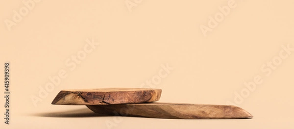 Fototapeta Background for products cosmetics, food or jewellery. Rustic wood pieces podium. Front view.