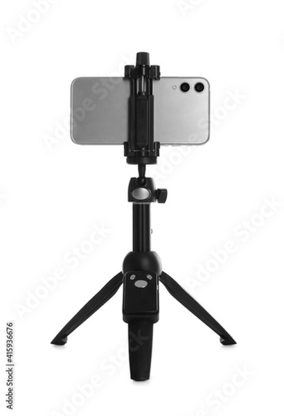 Fototapeta Smartphone fixed to tripod on white background