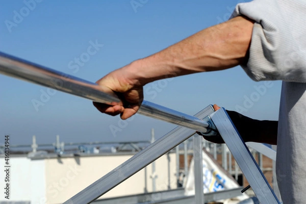 Obraz main au travail