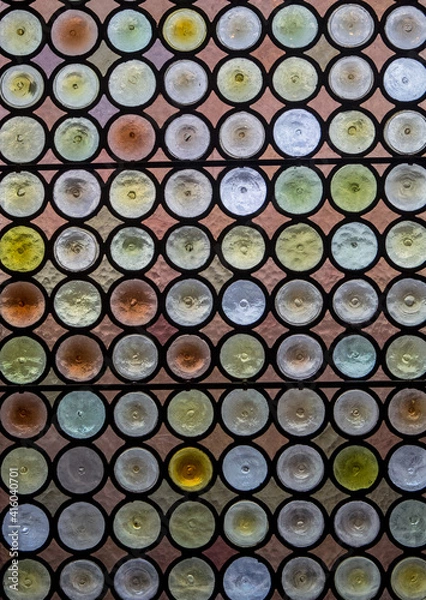 Fototapeta Stained glass window with geometric pattern.