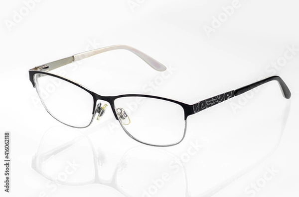 Obraz glasses on a white background with reflection